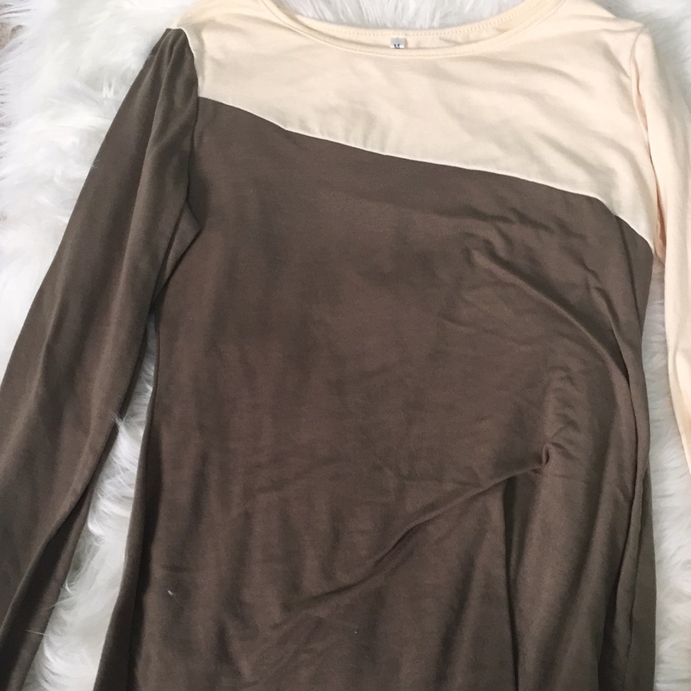 Green and Cream colored long sleeve shirt.